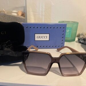 Gucci Pink Sunglasses with bag and case.